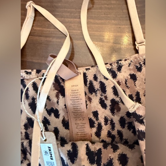 SKIMS Leopard-Print One-Piece Bodysuit - Picture 8 of 8